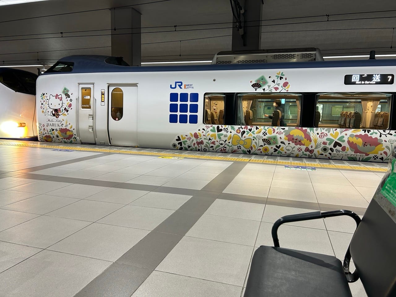 A Hello Kitty train waiting to depart.